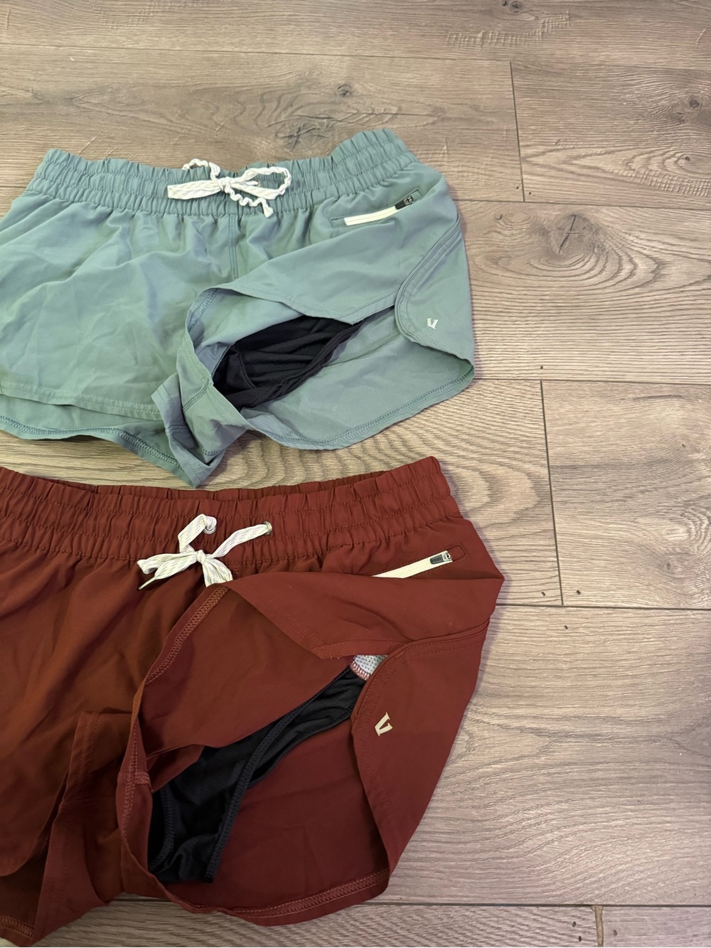 Vuori Women's Athletic Shorts - Light Blue & Brick Red - Picture 2 of 6